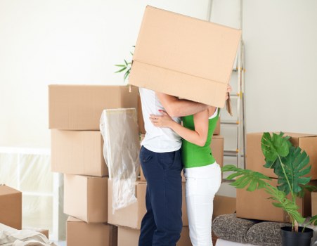 Furniture and boxes being handled during a Waterloo van move